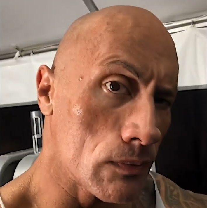 The Rock raising eyebrow